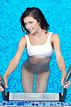 Petite titted miniature adolescent Divina A amplifying nude outdoors by the pool