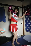 Japanese cheerleader Tomomi Matsuda hikes her costume and masturbates ahead of act of love
