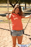 Youthful juvenile Brittany Maree flashes her underclothing on playground swing keen