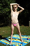 Mini titted Hannah Hays in bikini enjoying vaginal insertion in the sunshine
