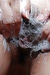 Asian teen taking shower and exposing her sycophantic pussy in close near