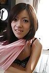 Asian teen Harumi Matsuda undressing and exposing her honey pot
