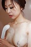 Playful asian teen Mariko Miyazawa getting nude and taking shower
