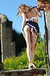 Sticky young Eva Gold flashing untamed panty upskirt and going topless in the sun