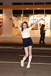 Diet dark hair juvenile Audrey Star posing in a skimpy short skirt outdoors