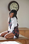 Excited schoolgirl Ayla Sky jacking off in uniform and socks in the classroom