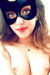 Gorgeous teen dark brown courtesan Esperanza standing topless for rough teats selfie
