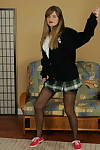 Bawdy schoolgirl winsome off her uniform and posing in underware