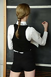Thin blond bookworm in glasses getting stripped in the classroom