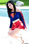 Brunette hair cosplay beauty Catie Minx gets undressed Superman suit by the pool