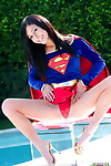 Brunette hair cosplay beauty Catie Minx gets undressed Superman suit by the pool