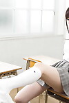 Japanese schoolgirl jerks off her teachers pecker with her barefeet