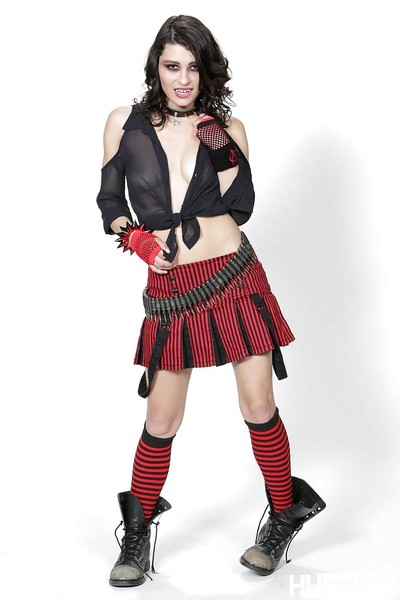 Splendid dark brown Raven Rockette is posing in her red petticoat