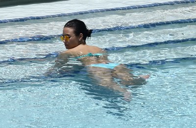 Demi lovato shows off her anus in a bright blue bikini