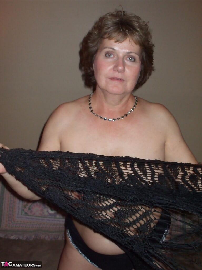 Erotic calm wife Titsy Bliss shes lace shawl to expand topless in appealing string