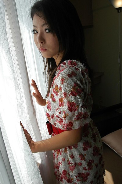 Eastern young Nao Miyazaki undressing and exposing her gentile in close up