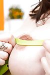 Glasses wearing infant concepted solo babe revealing baby bump and mambos
