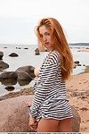 Euro hotty Michelle H showing off nice infant booty on beach for glamour pictures