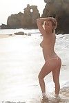 Appealing fairy model erotic dancing in bikini on the beach