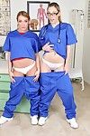 Fuckable nurses in uniform giving a kiss and flashing their asses and wet cracks