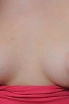 Smiley juvenile girl undressing and teasing her pink gap in close up