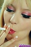 Elegant golden-haired floozy msinhale admires smokin\' cigarettes despite the fact u wat