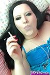 Sexual infant smoker rubs her cum-hole during the time that this chick smokes a cigarette