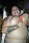 Lusty tattooed plumper with enormous flaccid jugs jacking off her cooter
