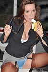 Nylon Jane is covered in marvelous nylons and is seductively eating a banana.