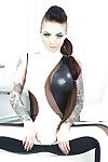 Enjoyable tattooed vixen slipping off her glam clothing and sexy pants