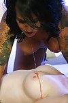 Steamy tattooed lesbian chicks make some clammy mouth job and scissoring doing