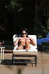 Kitty Bella gains caught on a peeping tom clip tanning uncovered outdoor