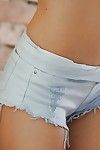 Fairy pornstar Sicilia modelling topless in short denim underwear