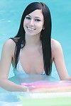 Soggy smooth head cum-hole juvenile catie minx swimming in the pool uncovered