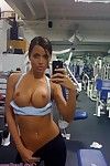 Rounded sporty fitness lass flashing at public gym