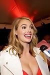 Kate upton shows off her immense mangos in a plunging red costume