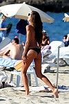 Izabel goulart shows off her fit wazoo in petite blue bikini