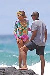 Titsy beyonce showing her wazoo in floral swimsuit