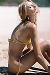 Maya stepper topless at the beach by cameron hammond