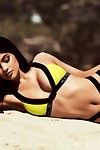 Kendall and kylie jenner posing in skimpy bikini sets
