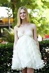 Elle fanning cleavy and leggy in white lace costume