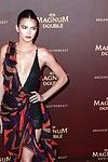 Kendall jenner braless showing vast cleavage and legs