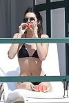 Kendall jenner watermelon snack in compact ebon bikini