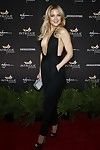 Kate hudson shows off her mambos in a racy jumpsuit