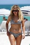Ellie goulding rounded in a striped monochrome bikini