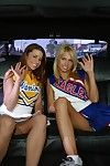 Sassy cheerleaders flashing their slits and giving a kiss on the agone seat