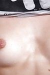 Alluring young Diamond Cross revealing her miniature love melons and bald cage of love