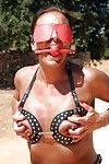 Blindfolded calm woman Lady Sarah playing with nude nipps outdoors