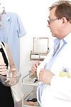 Redhead mellow lady in glasses going throughout complete gyno examinations