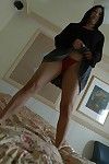 Dirty Japanese MILF Tomomi Sawamura undressing and playing with her dildos